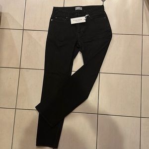black jeans with tags on, never worn